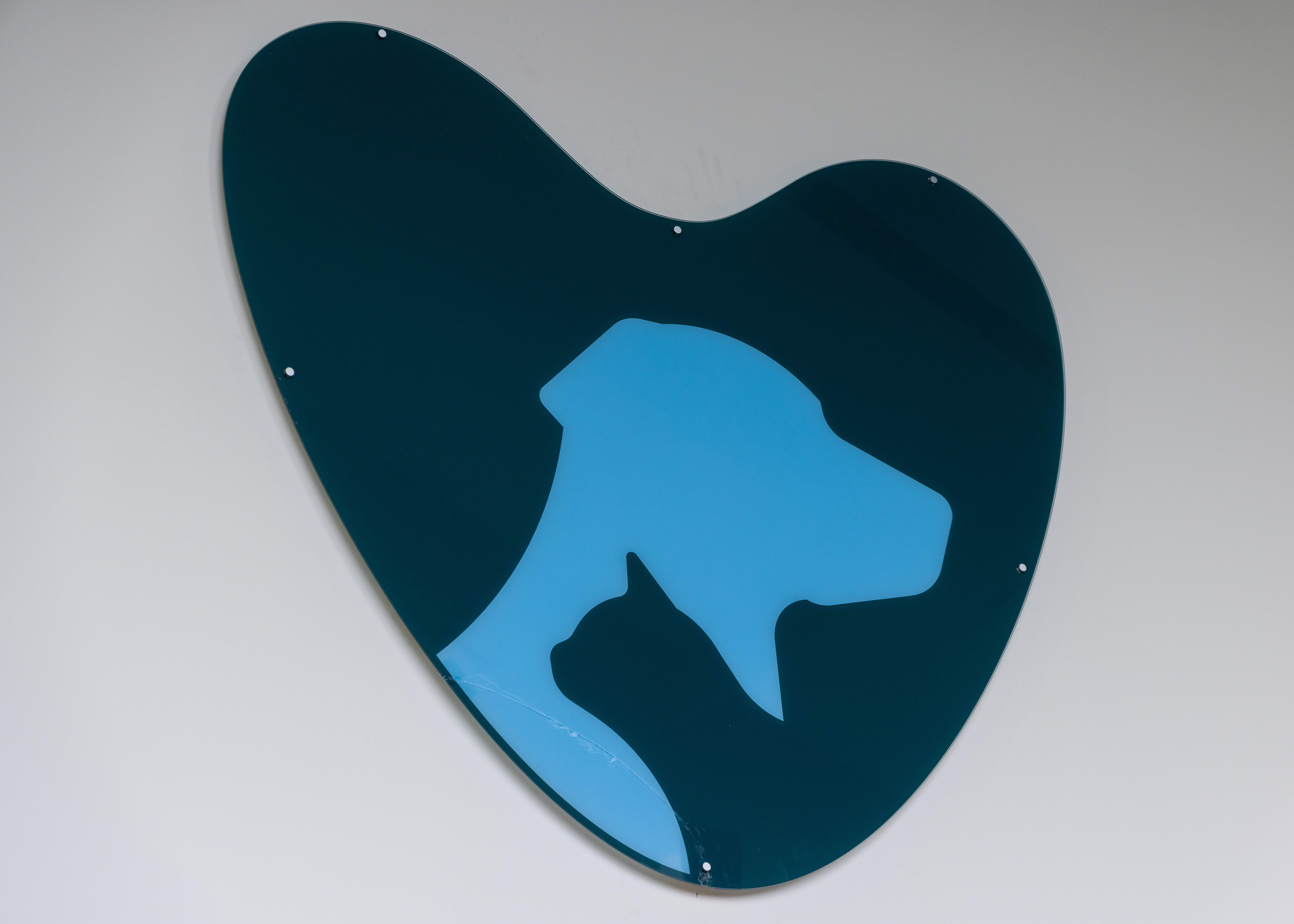 inspiring vet care Logo on wall