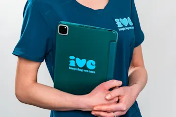 ivc vet nurse holding ipad - Services