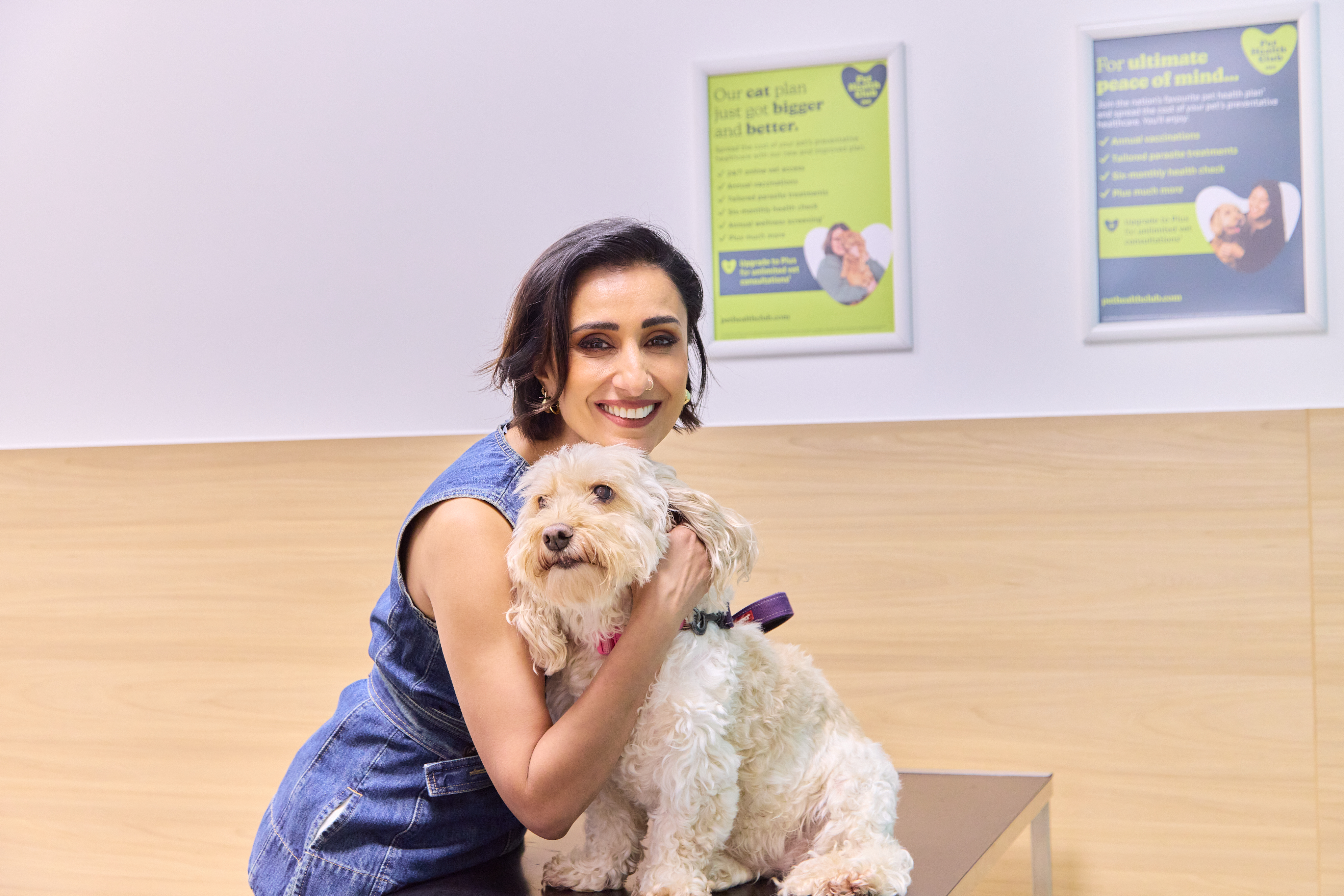 Anita Rani at an ivc vets with a dog
