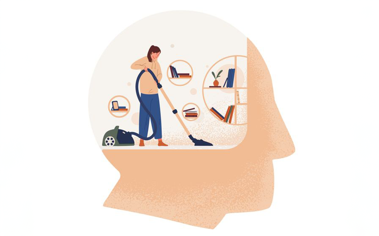 Illustration of a person vacuuming inside a head-shaped outline, symbolizing cleaning or organizing the mind. Shelves with books and decor are visible in the background.