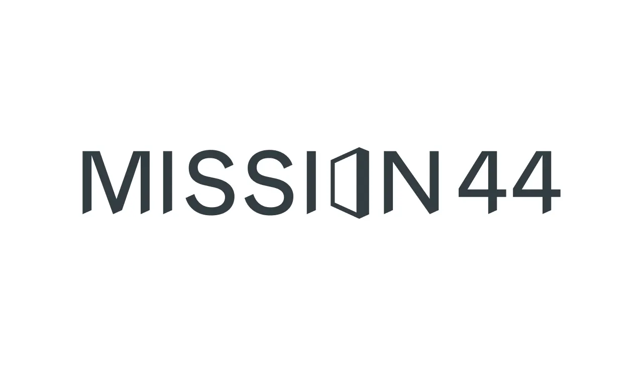 The image shows the text MISSION44 in bold, modern black font, with the O stylized as an open hexagonal shape. The background is white.