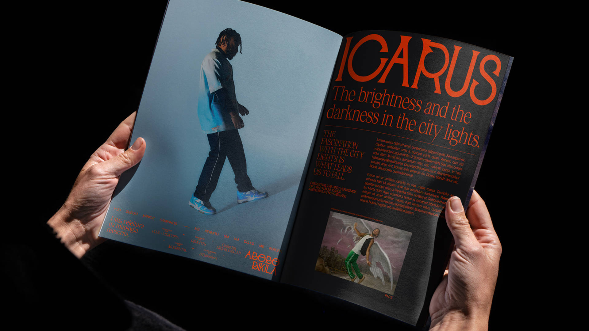 A person holds open a magazine featuring a full-page photo of a man in casual clothes on the left, and the headline ICARUS with text and an image of a figure with wings on the right.