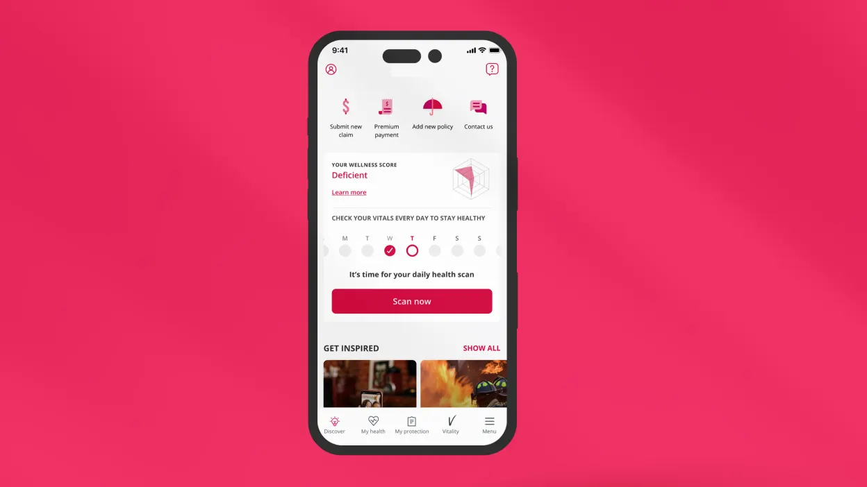 A smartphone displays a health app screen with options to submit a claim, make payment, and contact support. The main message says Deficient and prompts the user to scan for a daily health checkup.