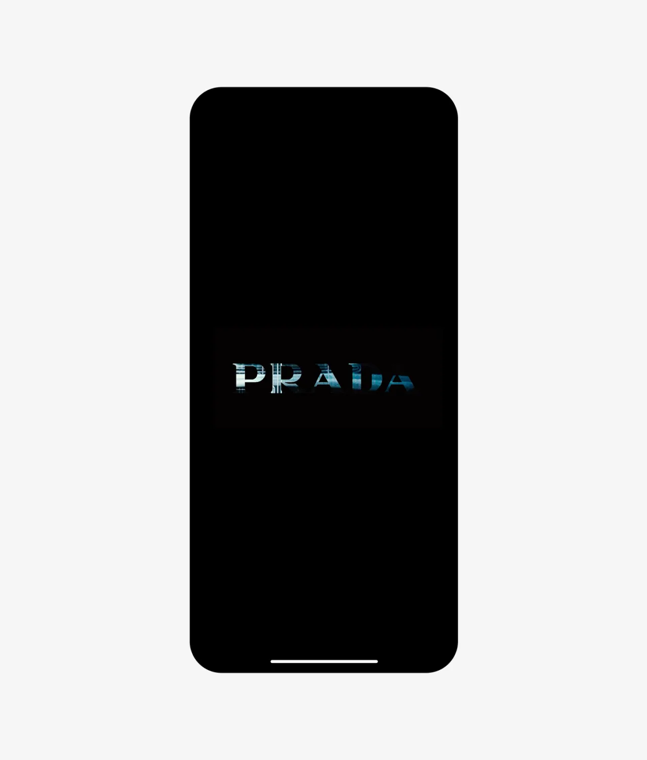 A smartphone screen displays the word PRADA in stylized, blue-toned text against a black background, centered on the device. A thin white bar appears at the bottom of the screen.