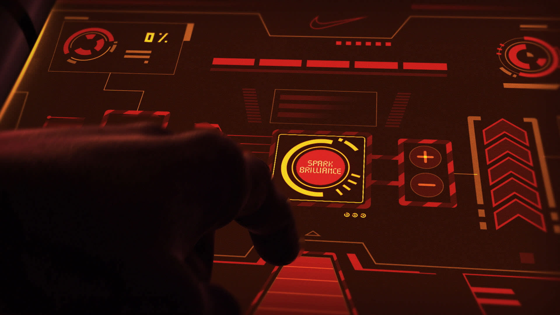 A hand interacts with a futuristic, glowing touchscreen interface displaying graphs, dials, and a central button labeled SPARK BRILLIANCE, surrounded by red and orange digital elements.