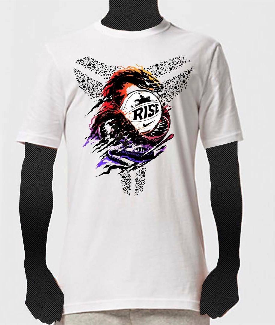 A white t-shirt featuring a colorful, artistic rugby ball design with the word “RISE” in bold letters, surrounded by splashes of red, purple, and black, along with abstract dotted patterns behind it.