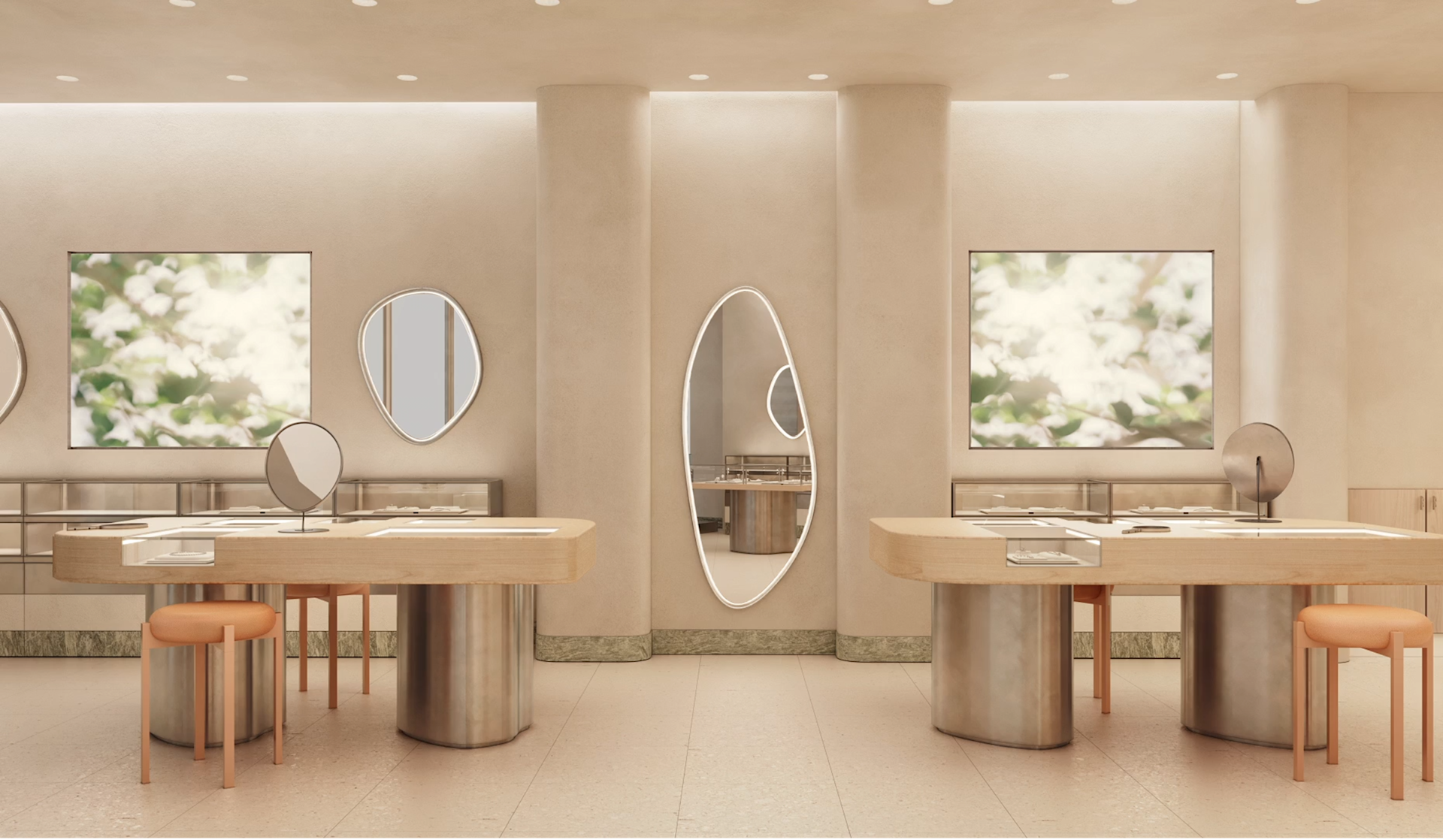 Georg Jensen store, two tables sit either side with chairs and mirrors