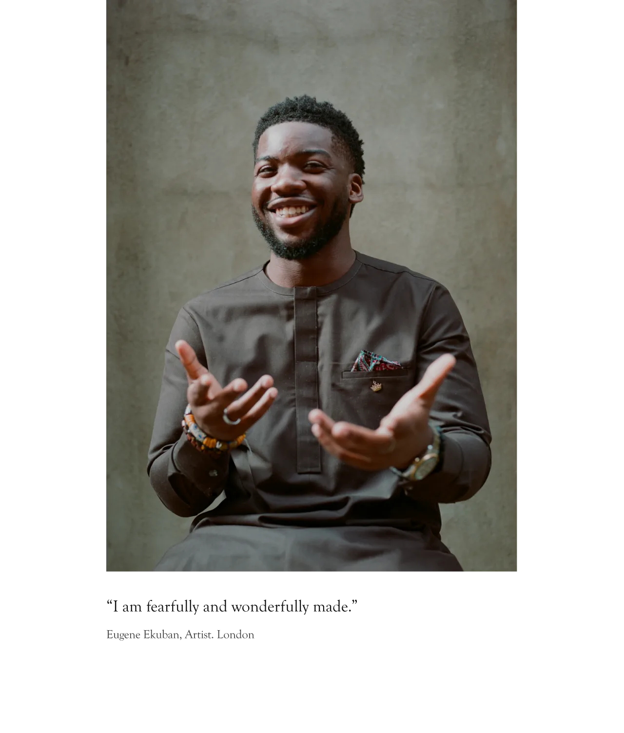 A smiling man wearing a dark traditional outfit sits against a textured wall, gesturing with open hands. Below is a caption: “I am fearfully and wonderfully made.” and the name Eugene Ekuban, Artist, London.