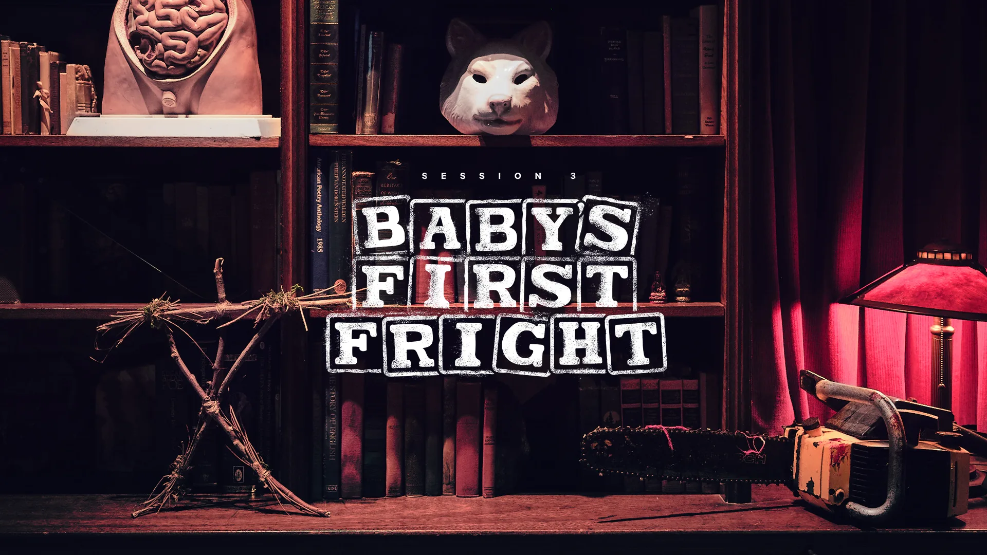 A dimly lit bookshelf with eerie props, including a brain sculpture, animal mask, stick figure, and chainsaw. Text in the center reads: Session 3 Babys First Fright. Red curtains and a lamp add to the spooky atmosphere.