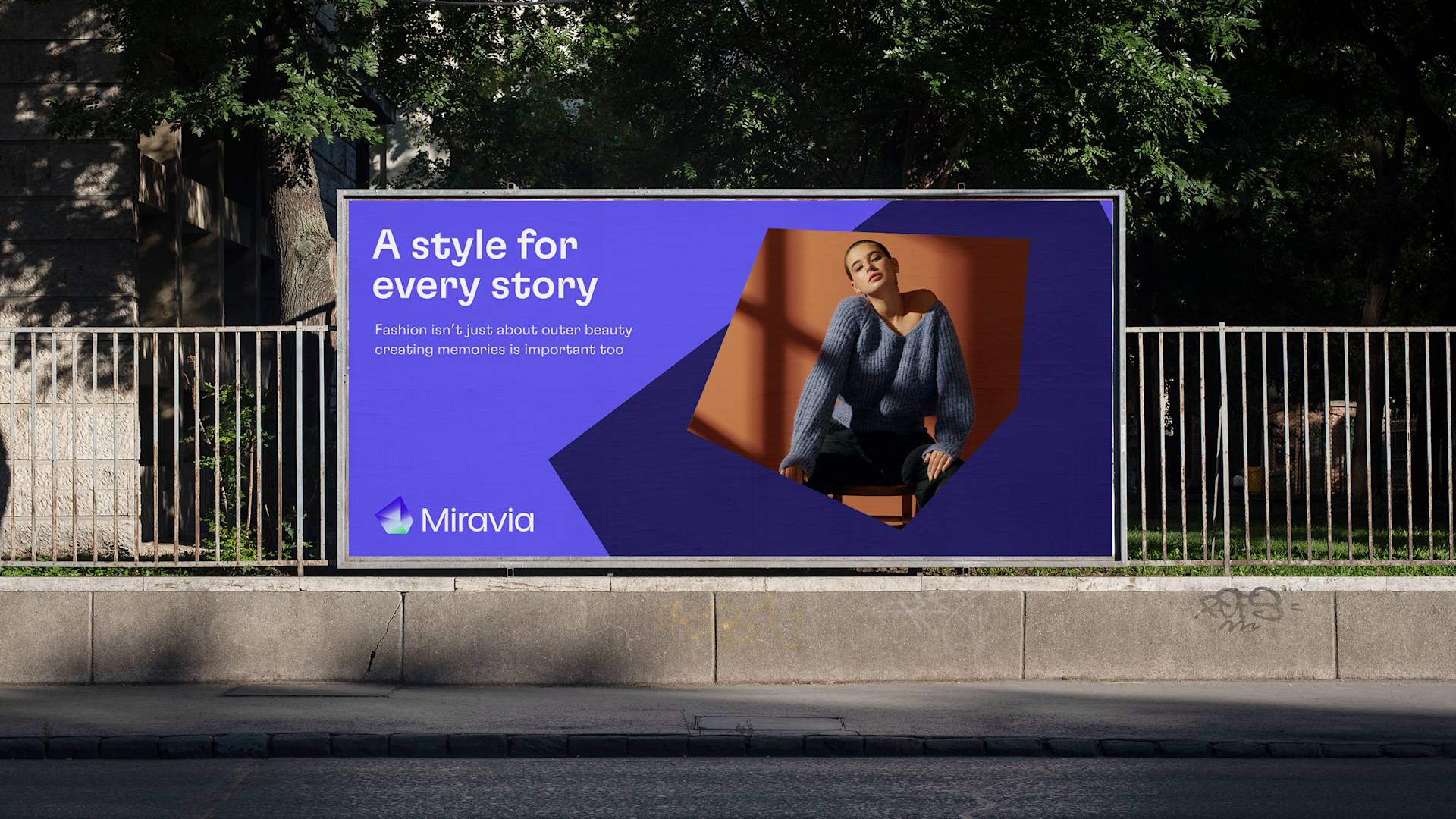 Billboard with a photo of a woman in a blue sweater, smiling and sitting, alongside the text: A style for every story. Fashion isnt just about outer beauty; creating memories is important too. Miravia.
