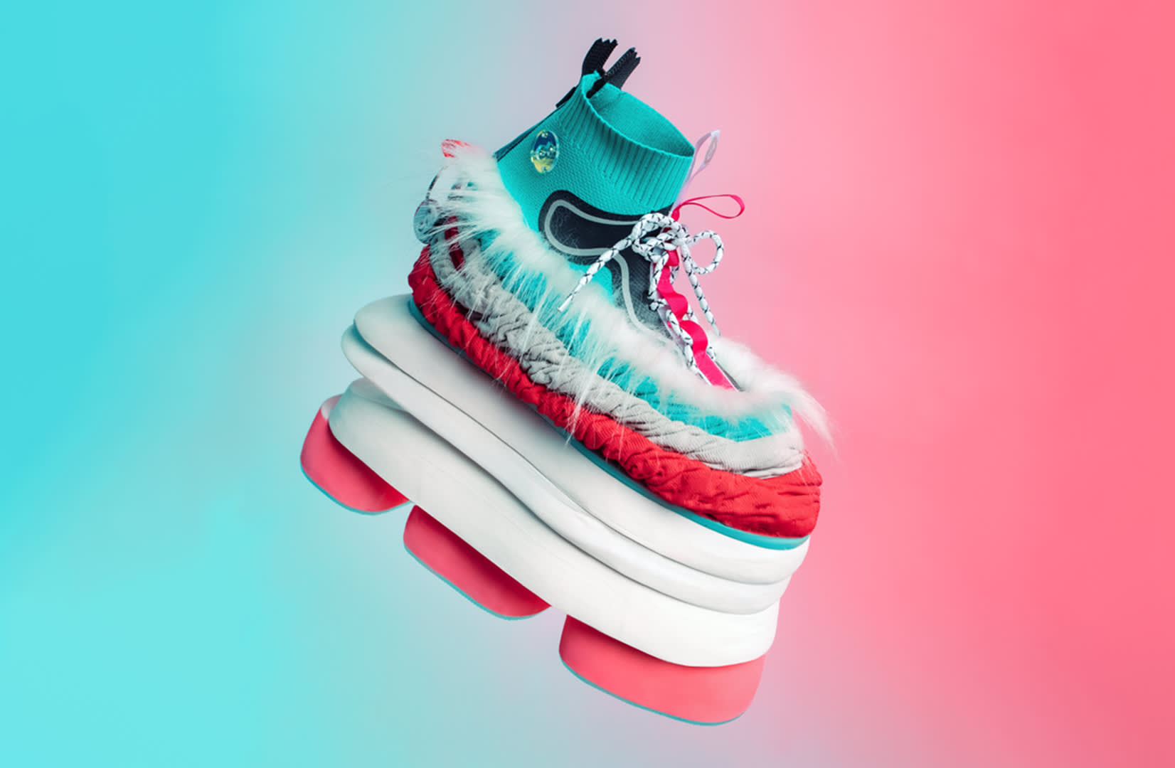 A colorful, futuristic sneaker with a thick, layered white and pink sole, teal upper, fluffy white trim, and black, red, and silver details, floating against a blue and pink gradient background.
