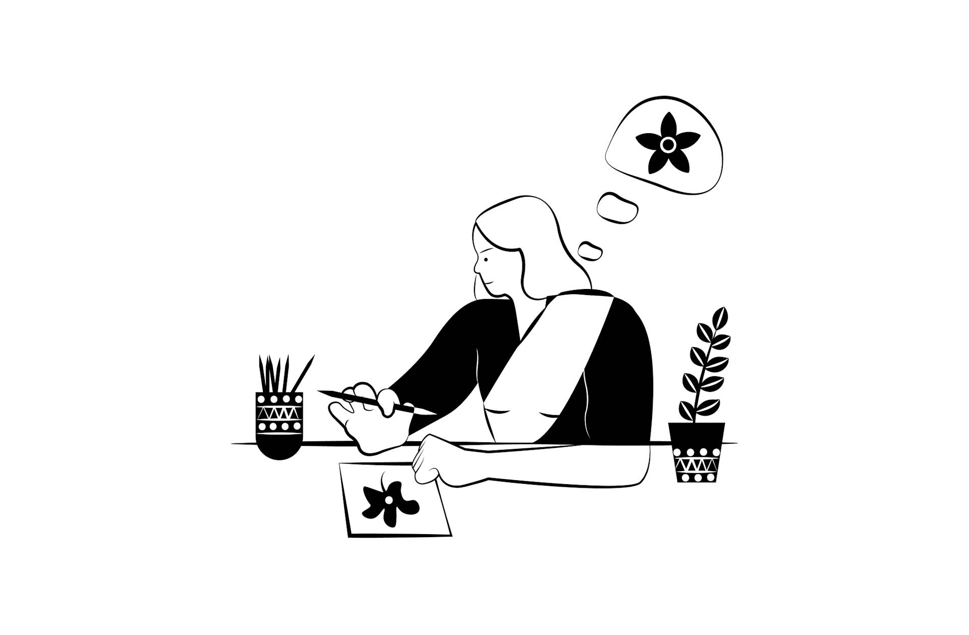 A person sits at a desk drawing a flower on paper, with art supplies and a potted plant nearby. A thought bubble above their head contains an image of the same flower.
