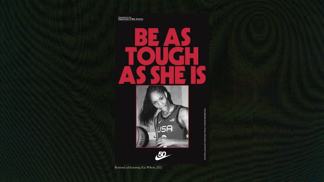 A black-and-white photo of a female athlete wearing a USA jersey appears below bold red text that reads BE AS TOUGH AS SHE IS. The image commemorates 50 years of Title IX and includes a small Title IX logo.