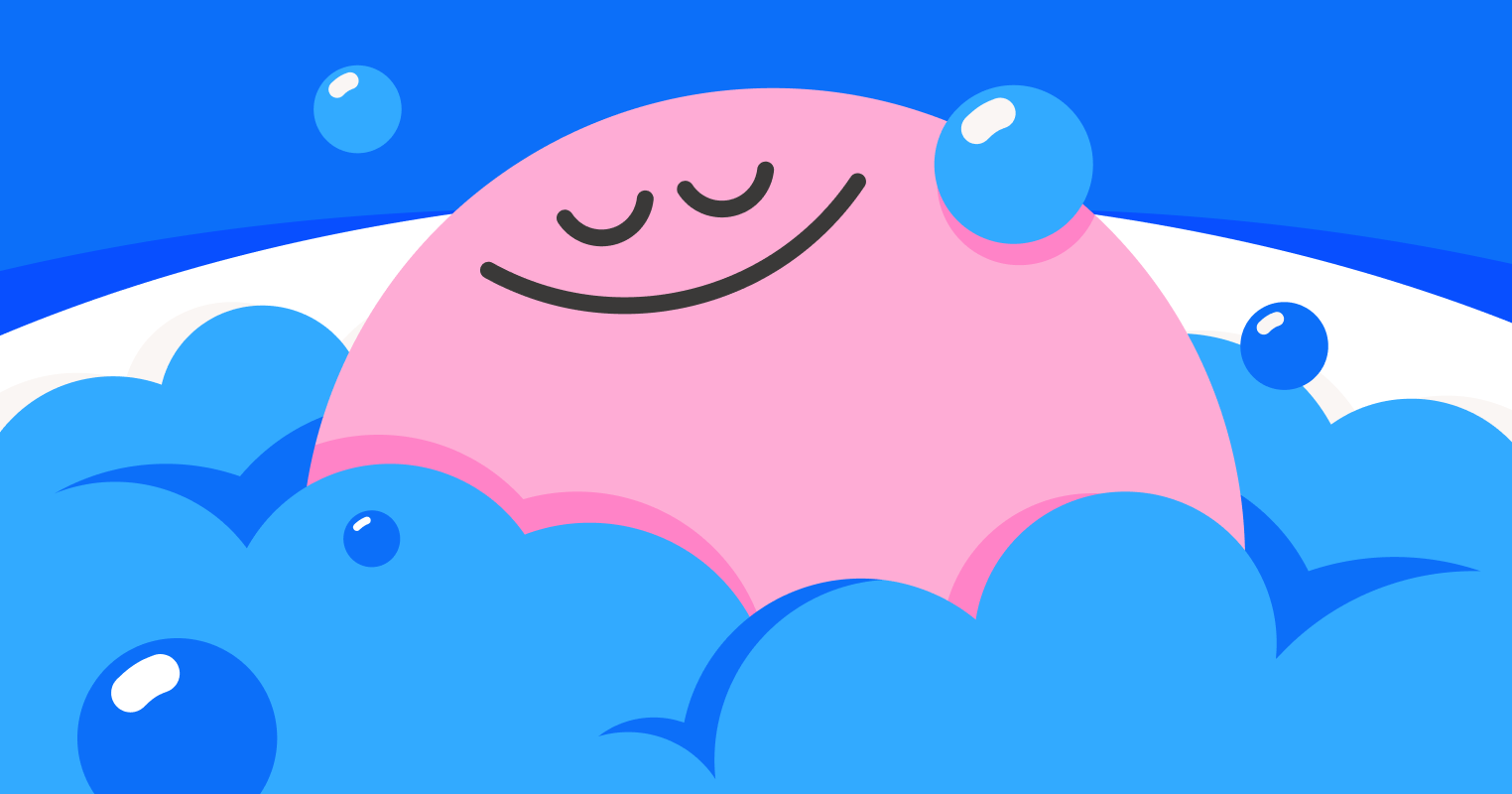 A pink, smiling, round character with closed eyes relaxes among fluffy blue clouds and bubbles against a bright blue background.