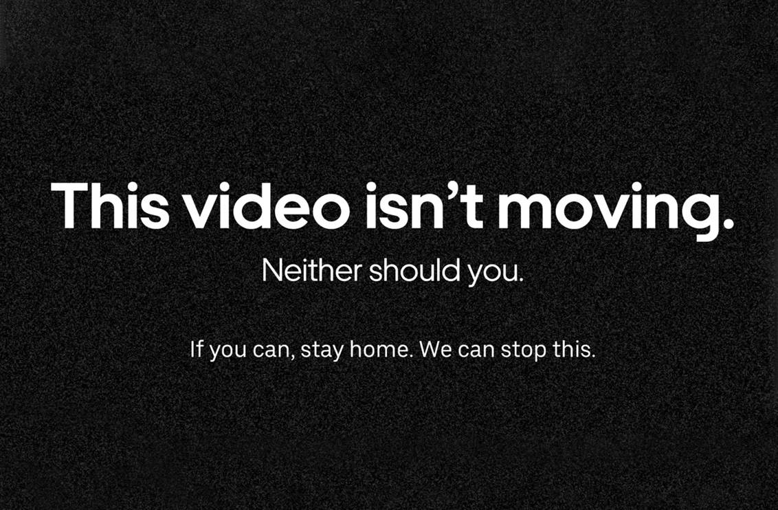 White text on a black background reads: This video isnt moving. Neither should you. If you can, stay home. We can stop this.