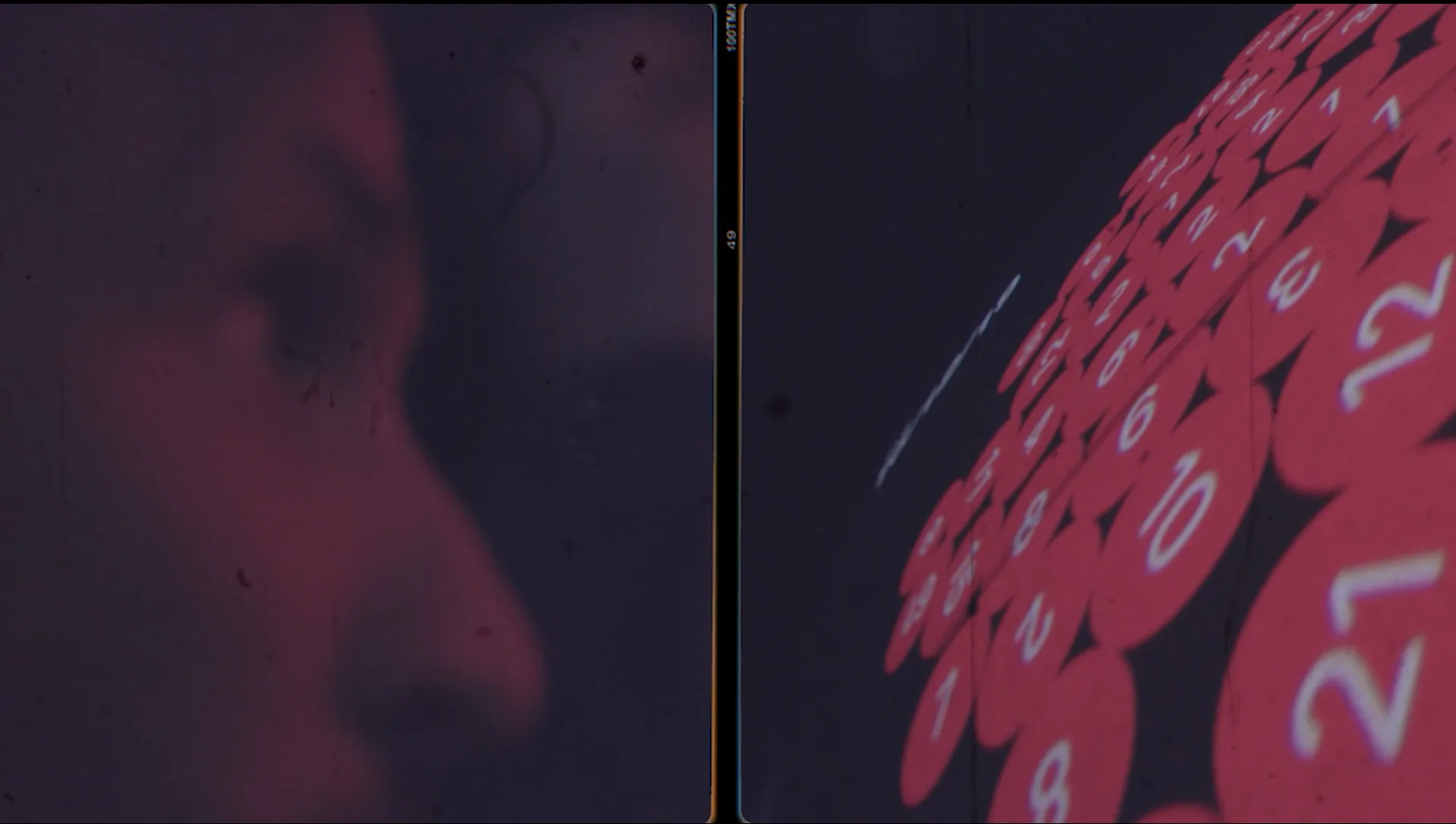 A split image: on the left, a close-up of a persons face in soft red light; on the right, a cluster of red circular tokens with white numbers on a dark background, possibly game pieces or lottery tokens.