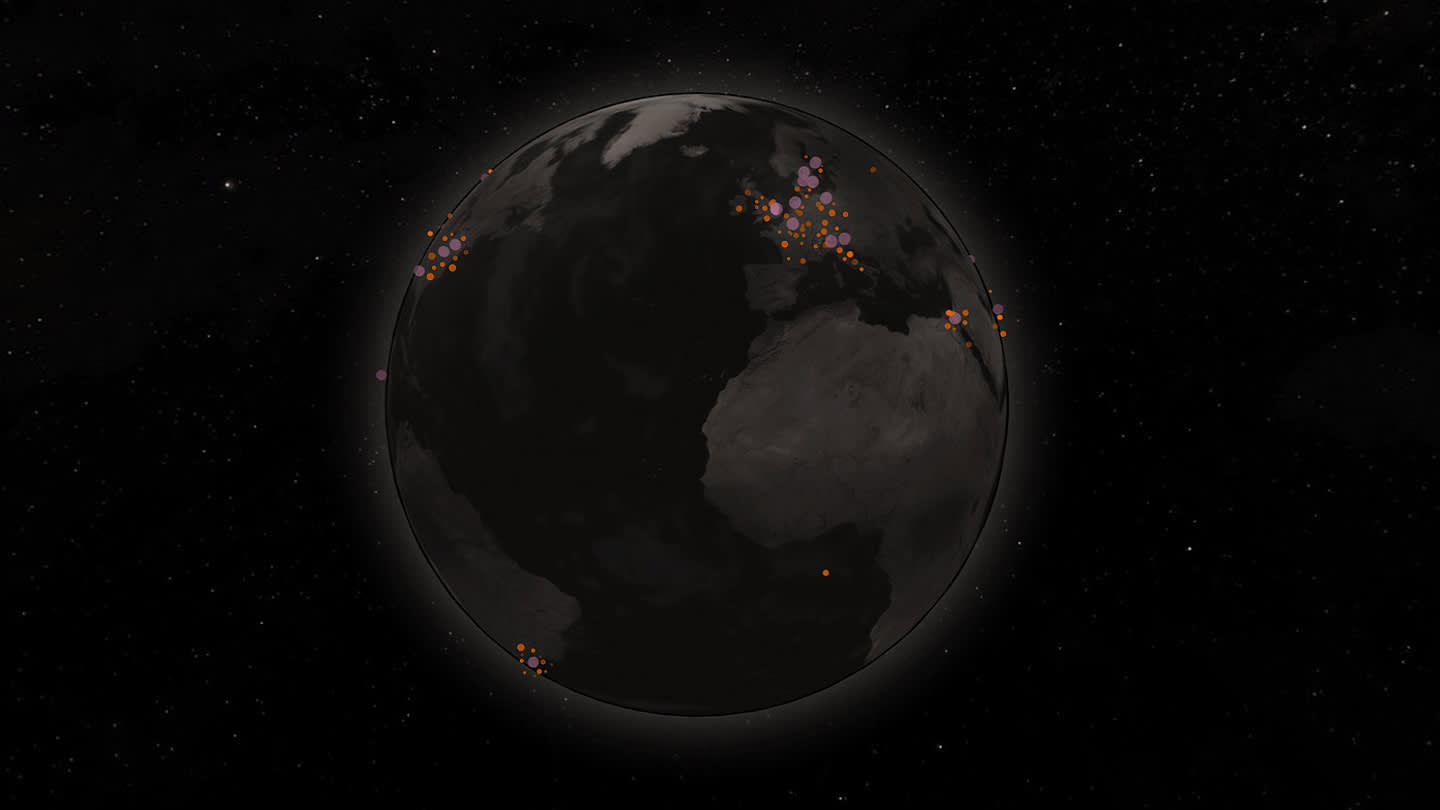 A dark, shaded view of Earth with clusters of colored dots over Europe and parts of Africa, set against a starry black background, possibly indicating data points or locations.