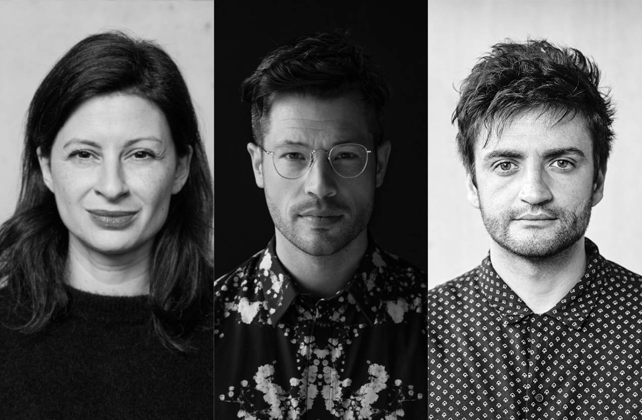 Black and white portraits of three people: a woman with shoulder-length hair on the left, a man with glasses in the center, and a man with tousled hair on the right. All are facing forward with neutral expressions.