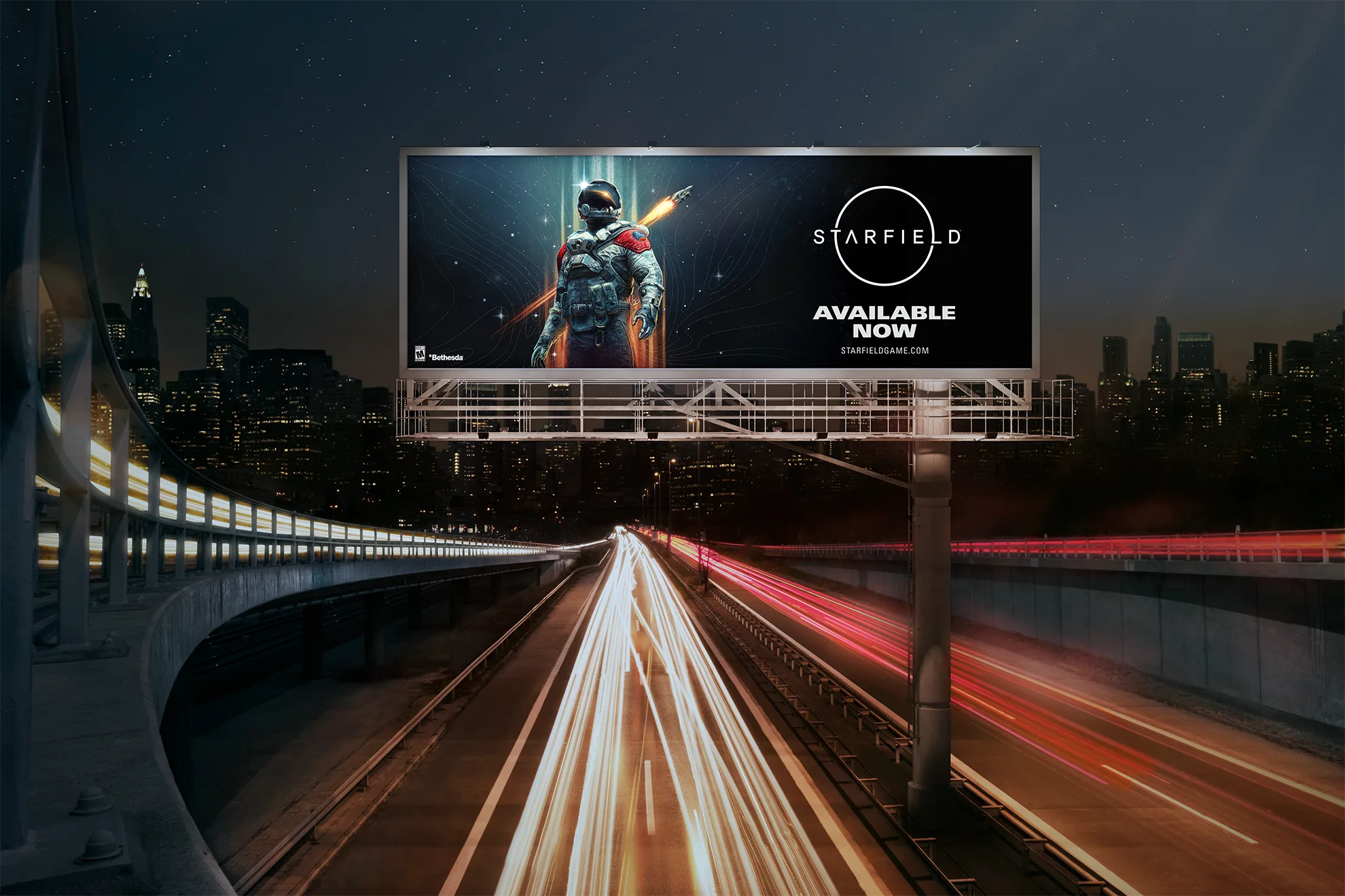 A brightly lit billboard above a busy city highway at night displays an ad for the video game Starfield, featuring an armored astronaut with a cosmic background and the text “AVAILABLE NOW.”.