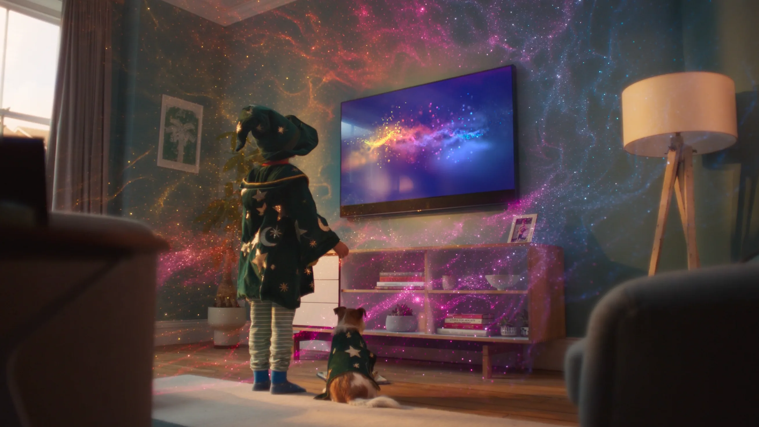 A child in a wizard costume stands with a dog in a living room, gazing at a TV. Colorful, magical swirls fill the room, creating an imaginative, enchanting atmosphere.