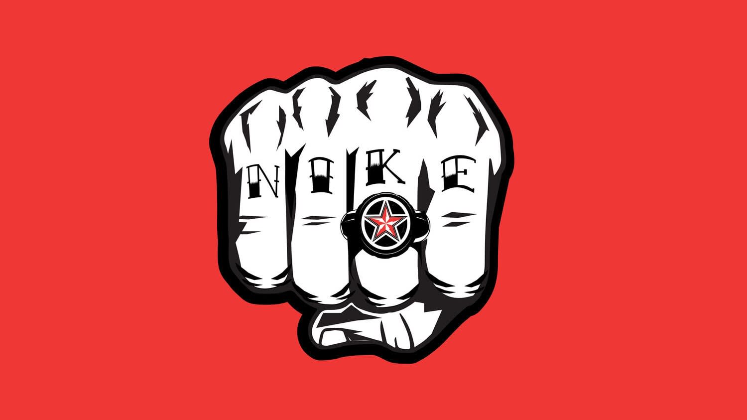 A white fist with bold black outlines is shown against a red background. The knuckles spell “NIKE,” and a ring with a red star is on the middle finger.