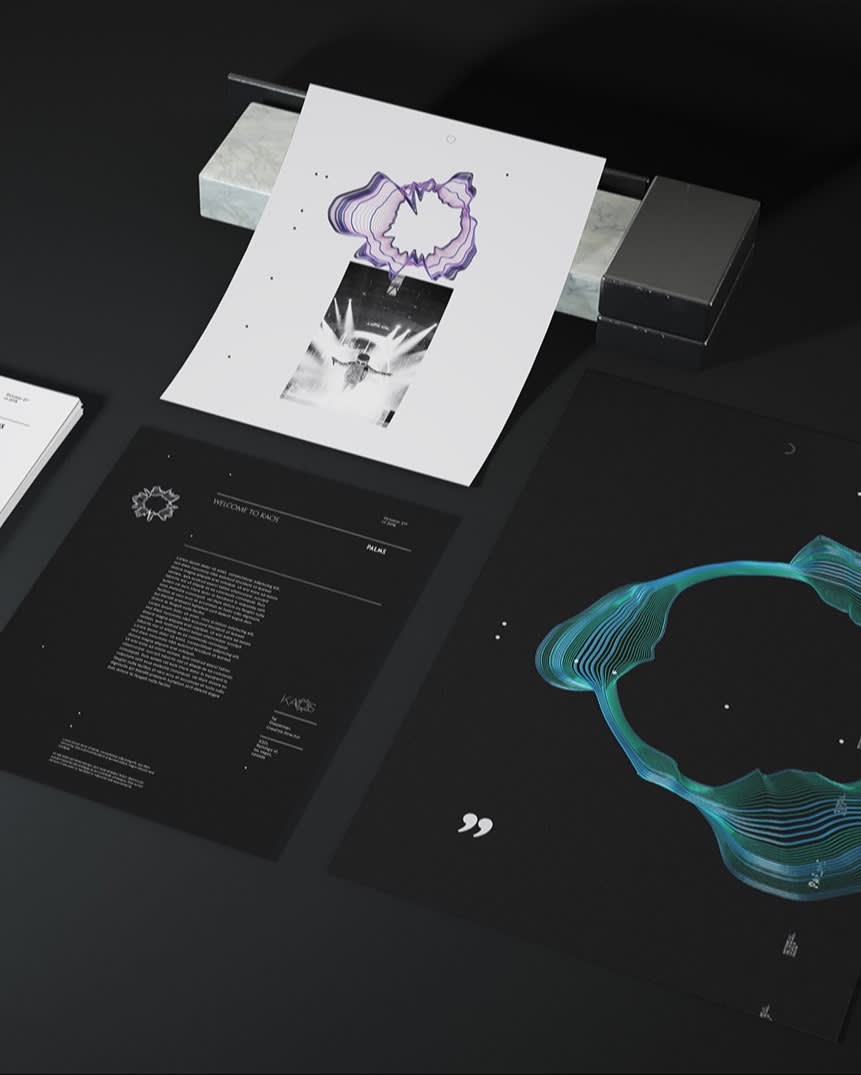 A set of modern, stylish prints and documents lies on a dark surface, featuring abstract line art, text, and geometric designs in black, white, purple, and teal tones. One sheet is elevated above the others.