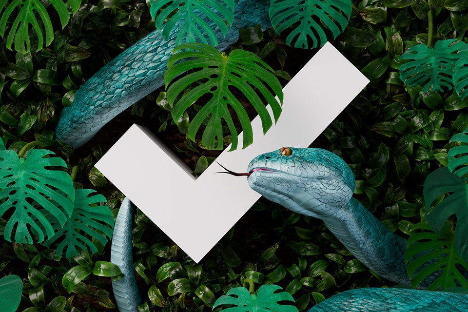 A blue-green snake slithers through dense green foliage and around a large white checkmark, with some leaves partially obscuring the checkmark and the snake’s head in the foreground.