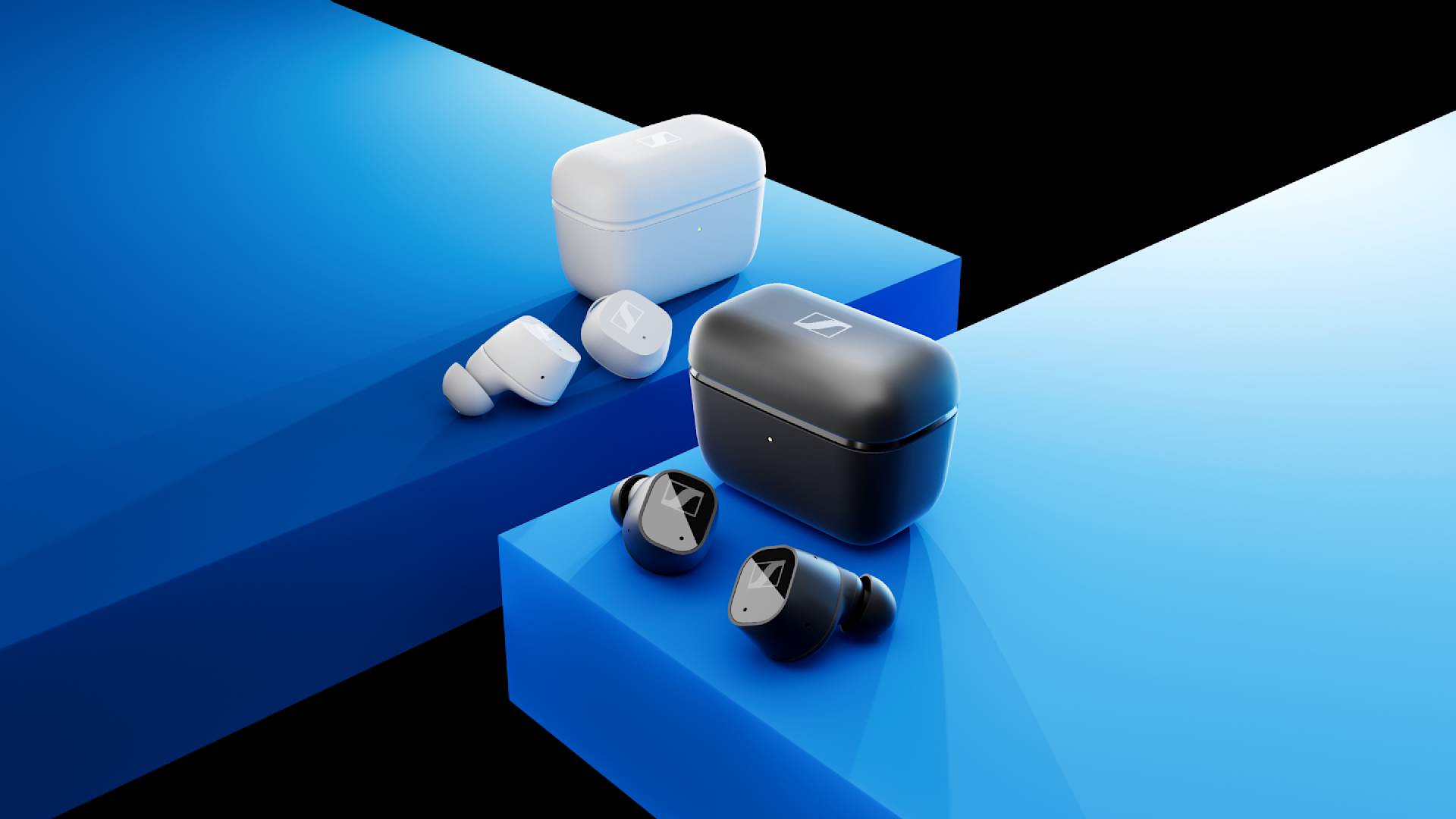 Two pairs of wireless earbuds with matching charging cases—one set white, the other black—are displayed on intersecting blue platforms against a black background.
