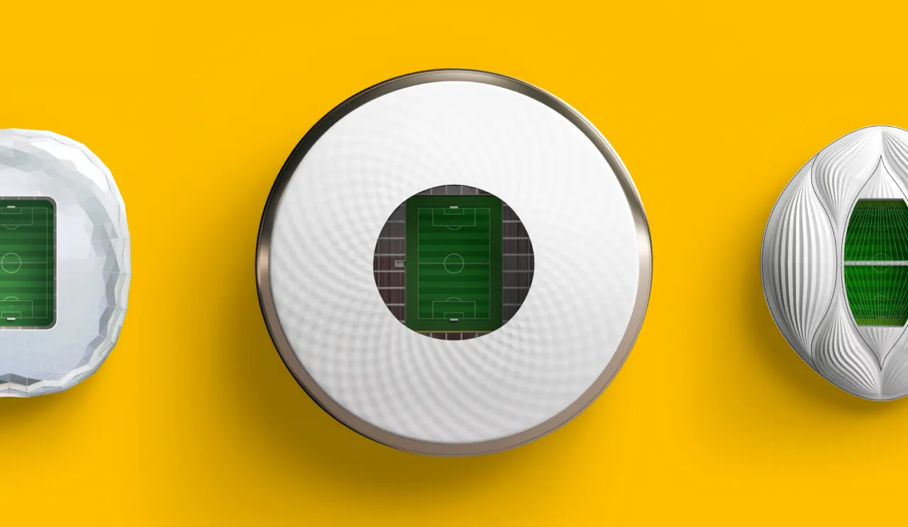 Three abstract objects with metallic and white textures, each containing a miniature green soccer field inside, are arranged against a bright yellow background.