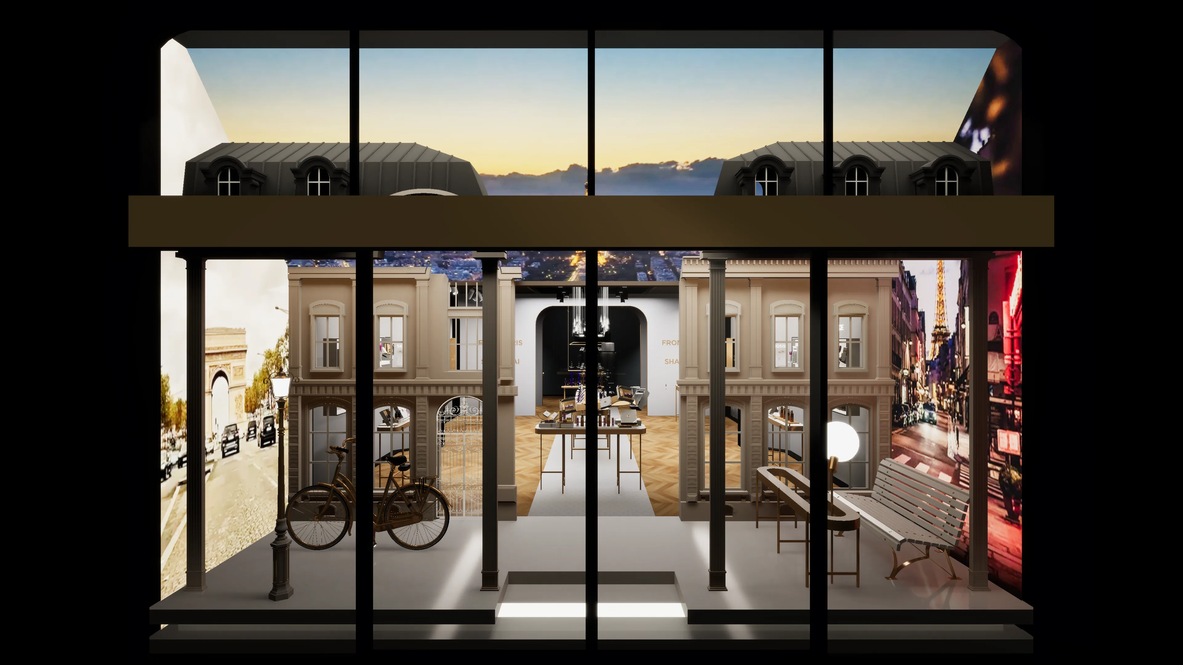 A modern interior space designed to look like a city street with European-style building facades, vintage bicycle, benches, street lamps, and a scenic cityscape backdrop at sunset.