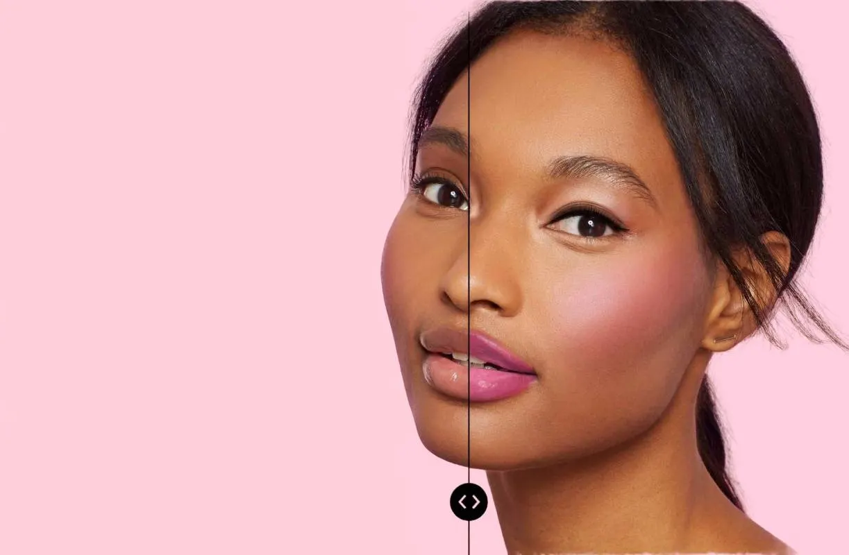 A woman with smooth skin and glossy pink lips looks at the camera against a pink background; the image is split down the center, showing different makeup looks on each half of her face.