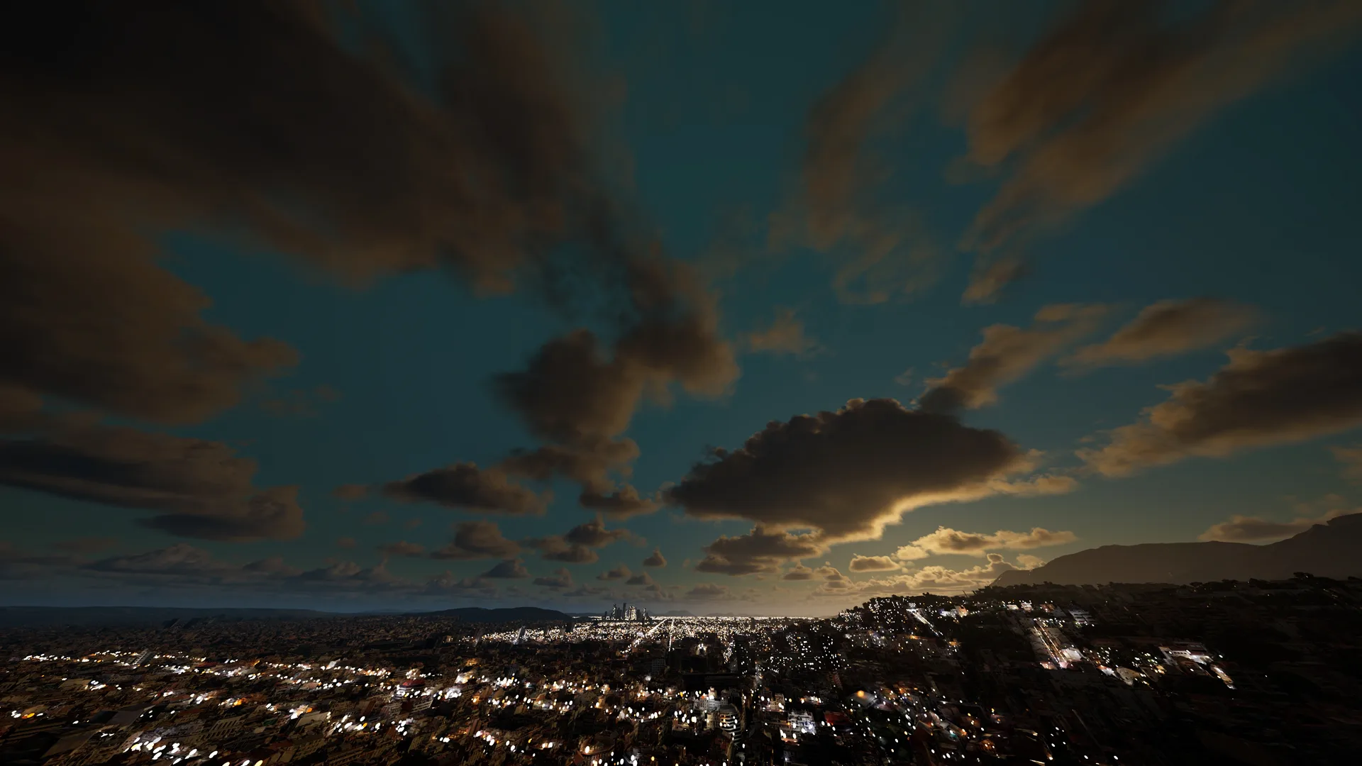 A cityscape at dusk with a dramatic sky filled with dark clouds. City lights illuminate the buildings below as the sun sets behind distant mountains, casting a golden glow along the horizon.