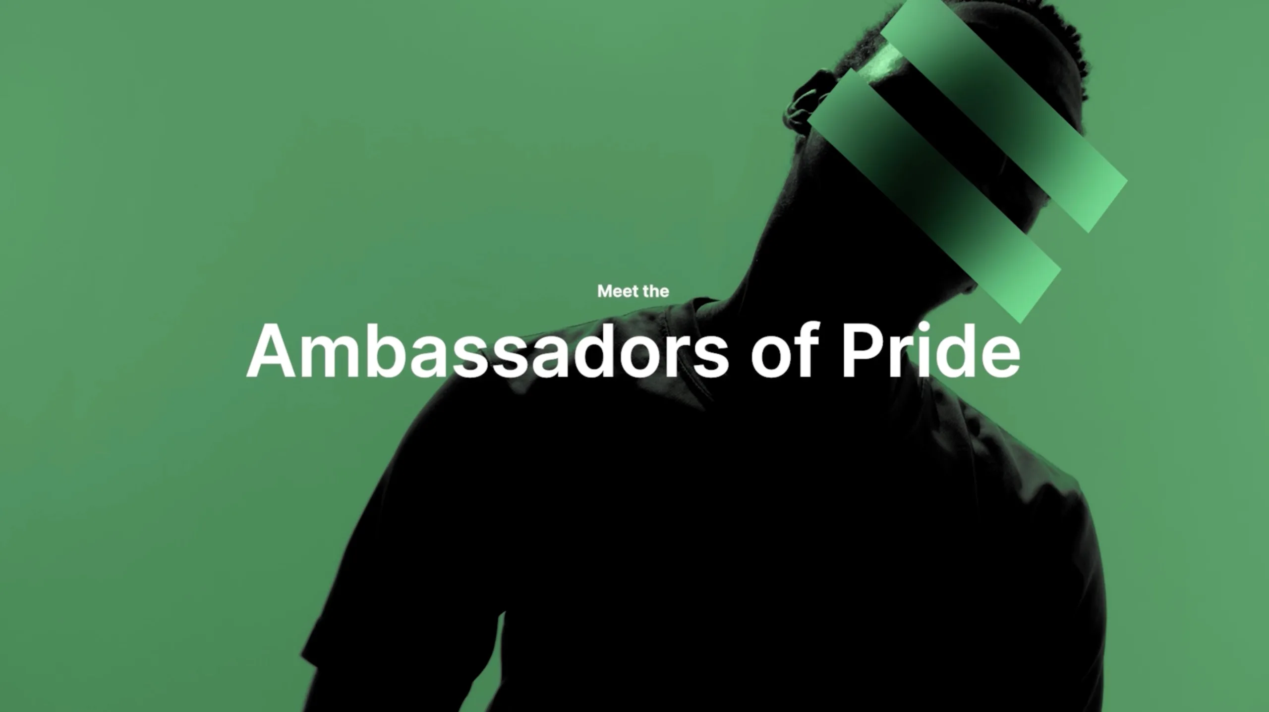 A person in shadow with green horizontal bars over their eyes stands against a green background. White text reads, Meet the Ambassadors of Pride.