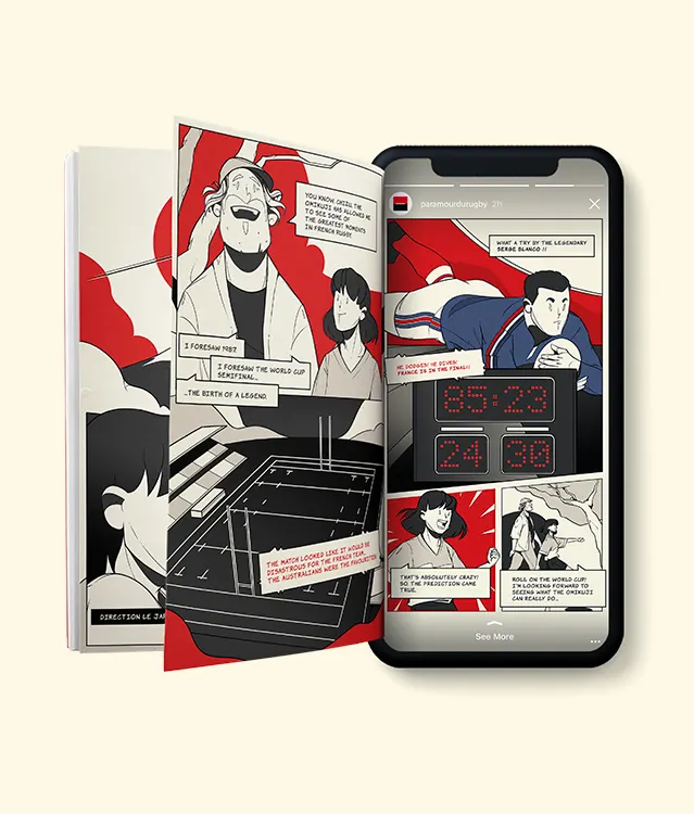An open comic book with bold red, black, and white illustrations sits next to a smartphone displaying similar comic-style artwork, suggesting a digital version of the comic seen on the phone screen.