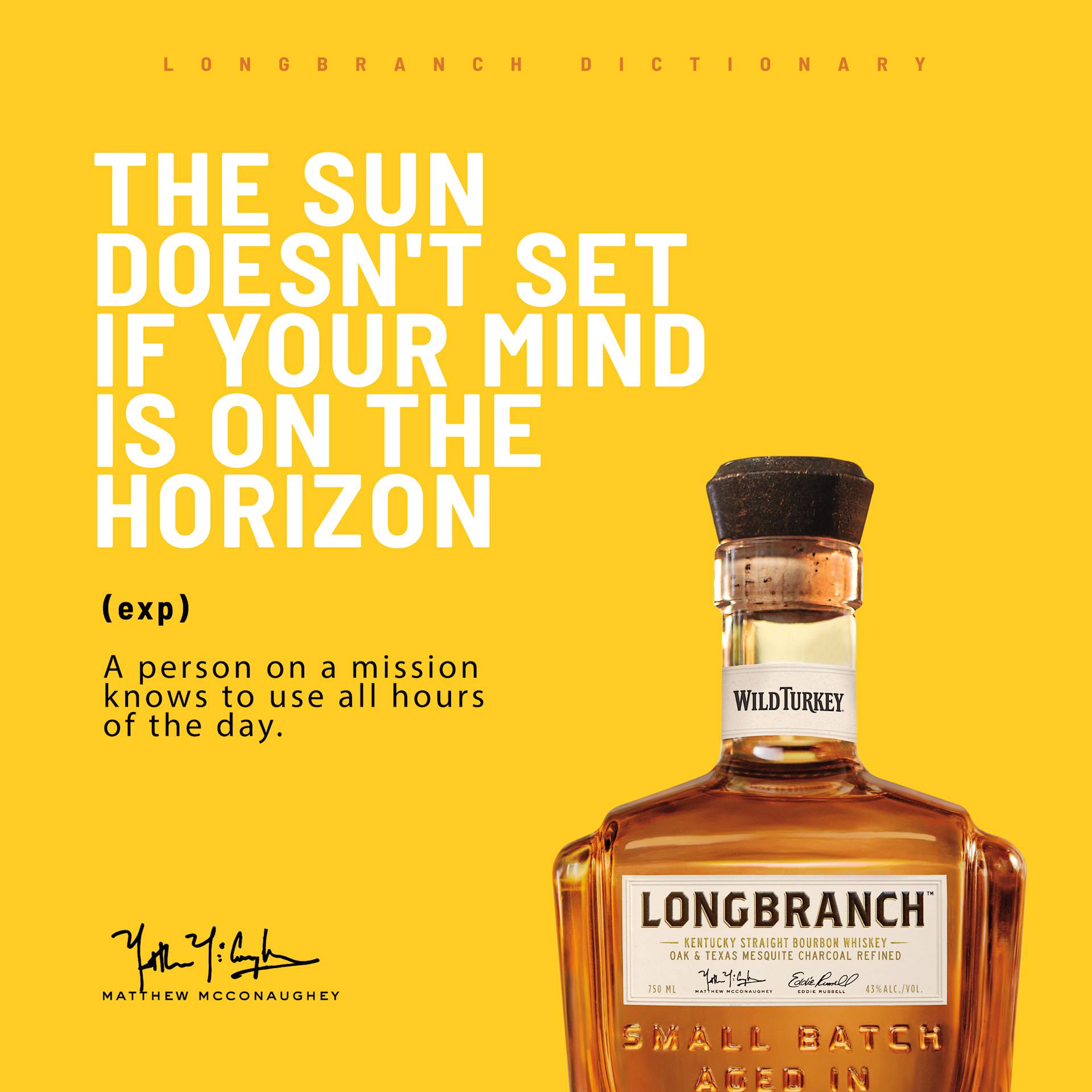 A bottle of Longbranch bourbon whiskey with a black cap on a yellow background. Bold white text reads, The sun doesnt set if your mind is on the horizon. Smaller text defines this as using all hours to pursue a mission.