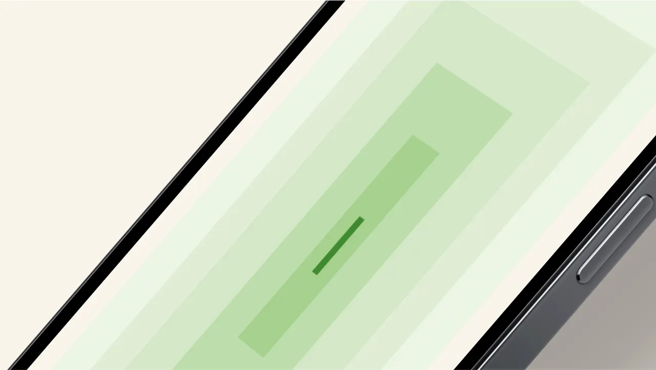 A close-up, angled view of a smartphone screen displaying green, rectangular, concentric shapes and a short green bar in the center, with part of the phone’s edge and side button visible.