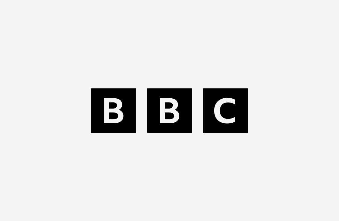 The image shows the BBC logo, featuring the letters B, B, and C, each in white inside a separate black square, on a light gray background.