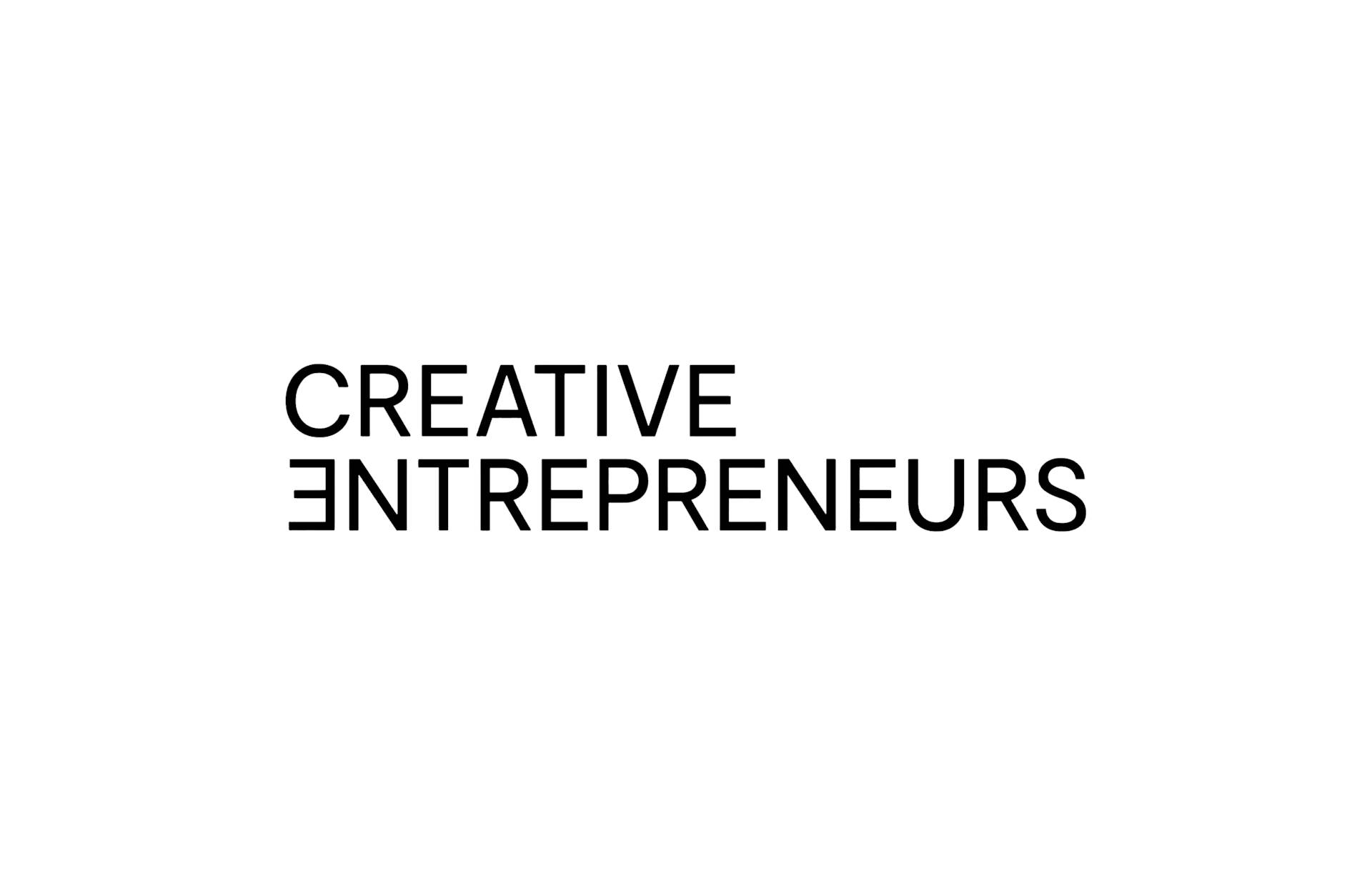 Black text on a white background reads “CREATIVE ENTREPRENEURS.” The word ENTREPRENEURS is flipped horizontally in a mirrored style, while CREATIVE is written normally.