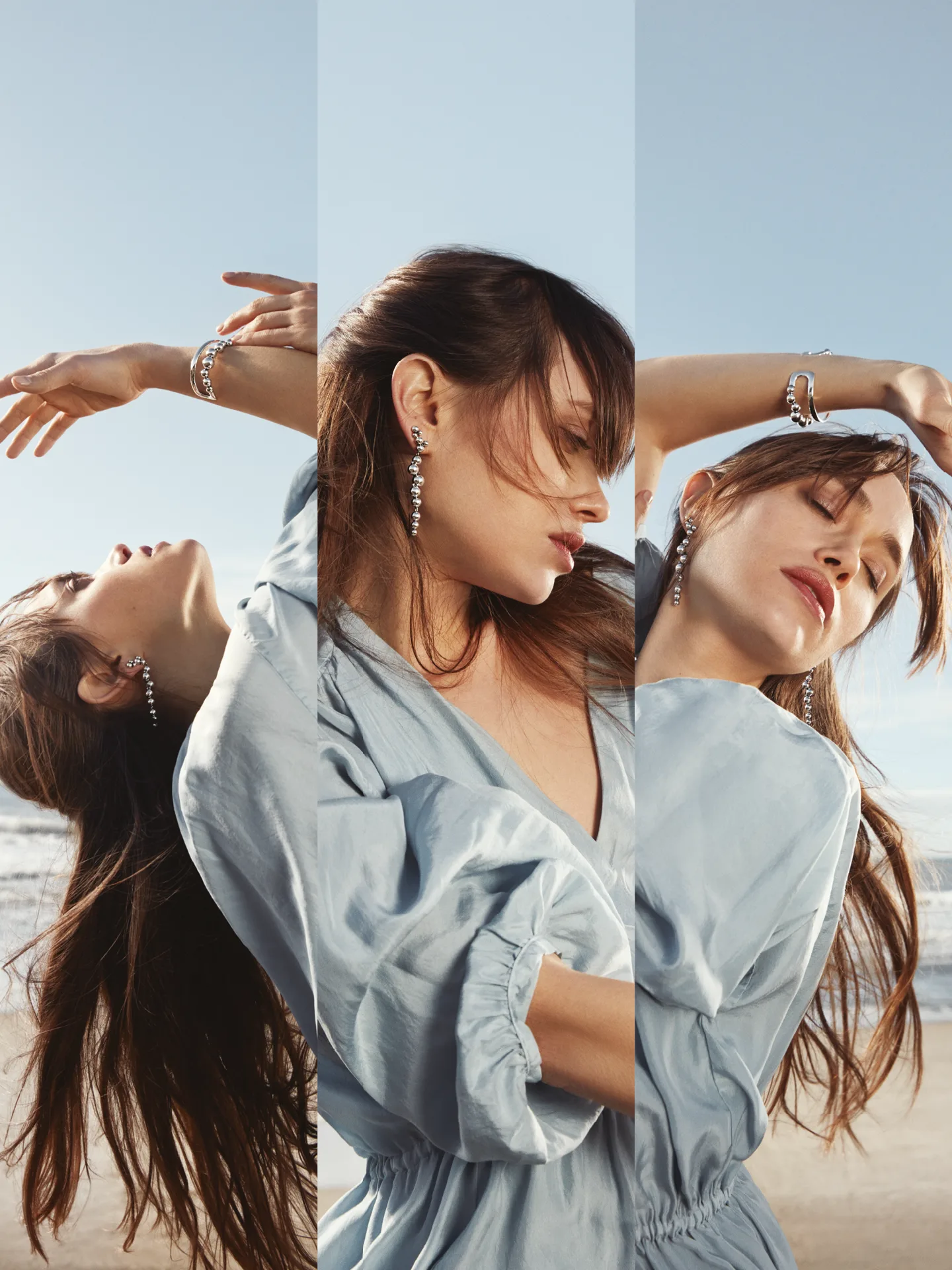 A woman in a light blue dress poses gracefully on a beach, captured in three overlapping panels with different expressive movements, against a clear blue sky.