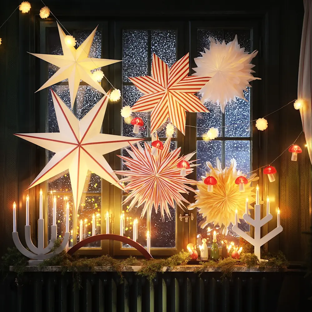 Vackra stjärnor gör sig fint tillsammans. Foto: Åhléns Julkampanj 2023 