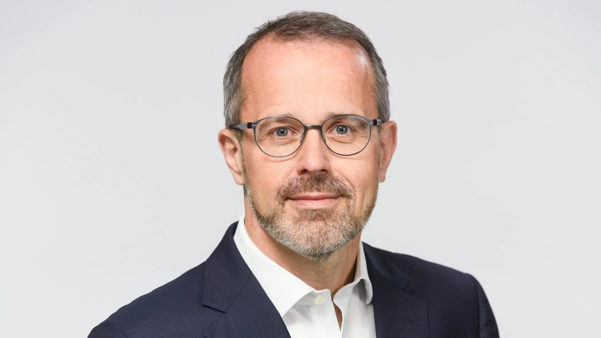 Portratifoto von Bayern-LB-Chefvolkswirt Dr. Jürgen Michels.