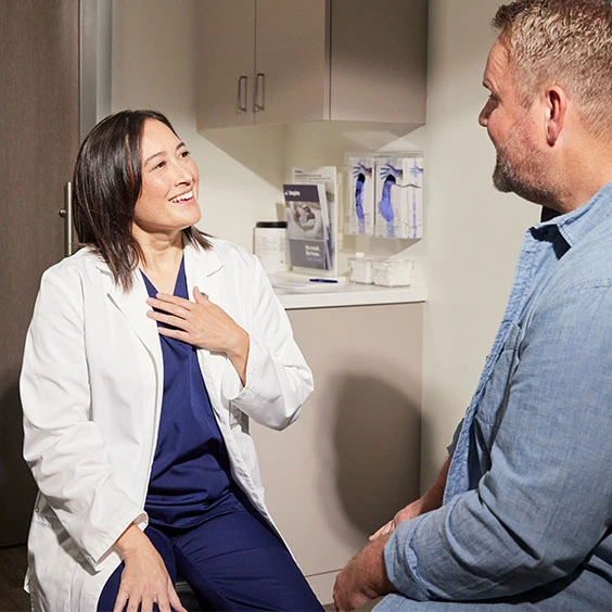 Inspire doctor consulting with patient in a clinical setting