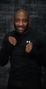 Retired, British professional boxer, Johnny Nelson competed from 1986 to 2005. He is currently the longest reigning cruiserweight world champion of all time, having held the WBO title from 1999 to 2005, making thirteen successful defences. Known as ‘The Entertainer’, Johnny also held the British cruiserweight title twice between 1989 and 1997, and the European cruiserweight title twice between 1990 and 1998. Since retirement, Sheffield-born Johnny has become a popular pundit on Sky Sports and hosts The Gloves Are Off.