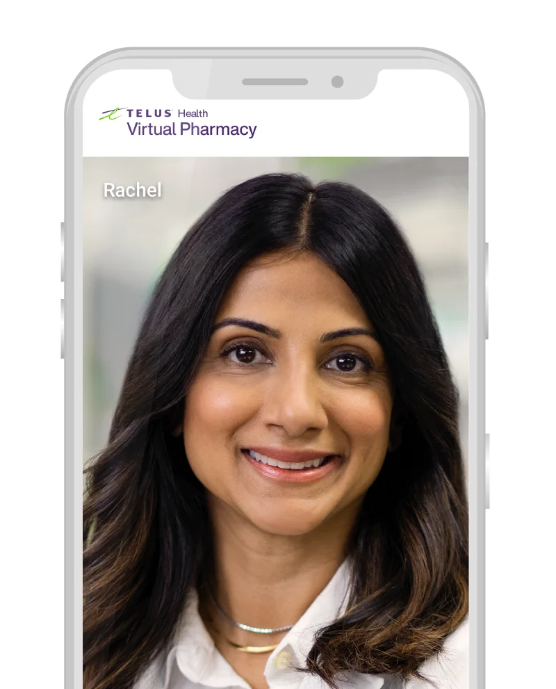 A close up of a pharmacist smiling during a one-on-one virtual consultation through the TELUS Health Virtual Pharmacy app.