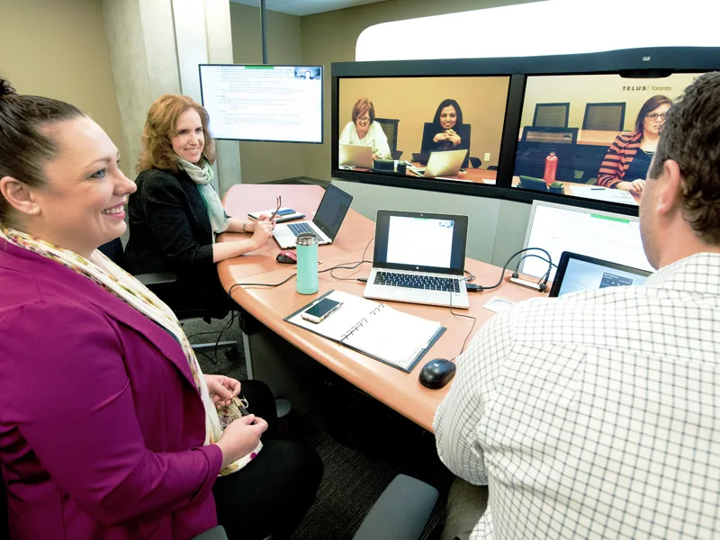 A team having a video conference meeting
