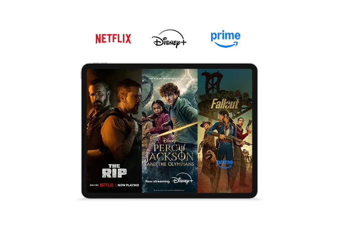 Tablet with the Netflix, Disney+, and Prime Video logos at the top. Three show posters are visible: The Rip, Percy Jackson and the Olympians, and Fallout.