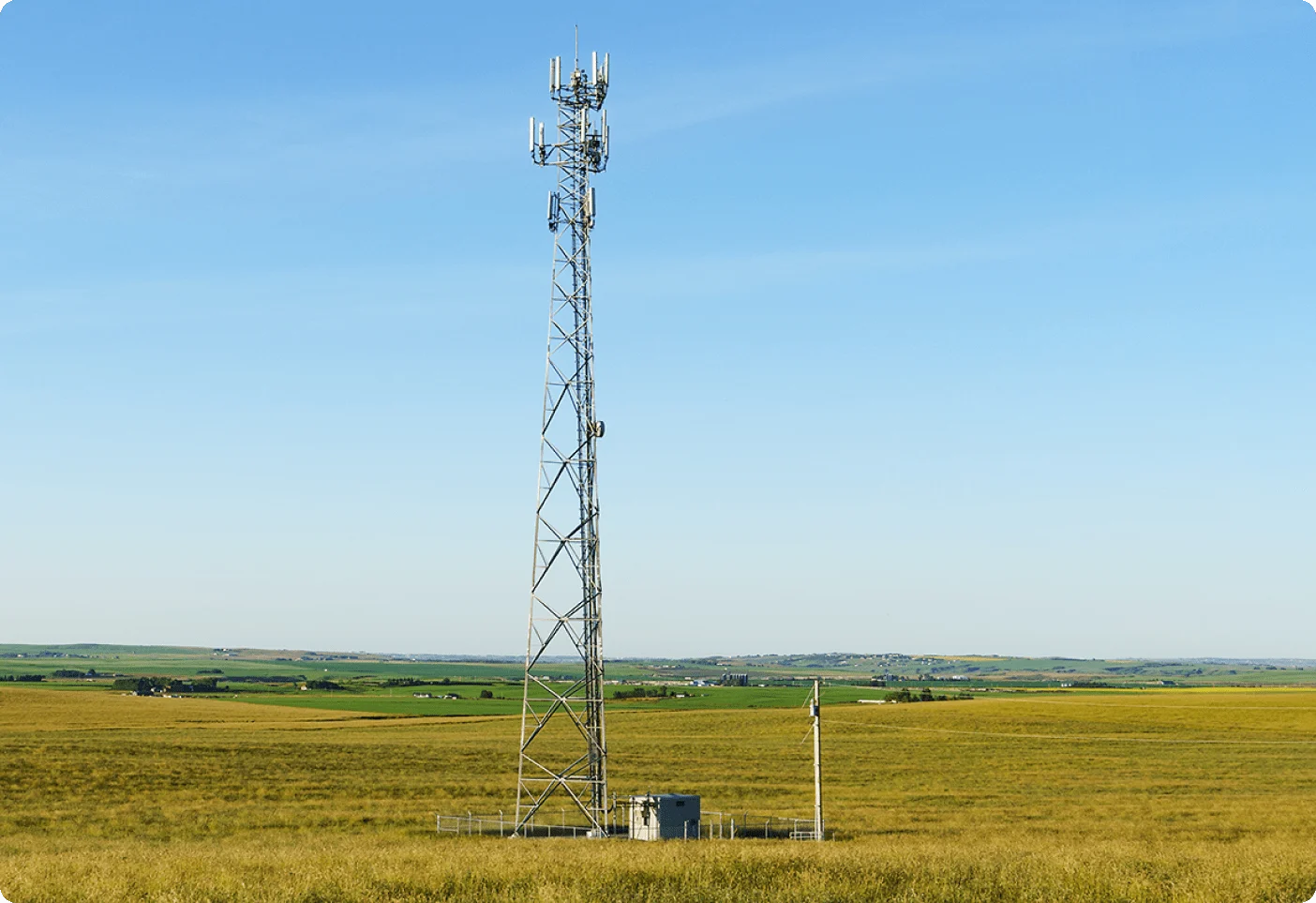 A cellular tower in a field