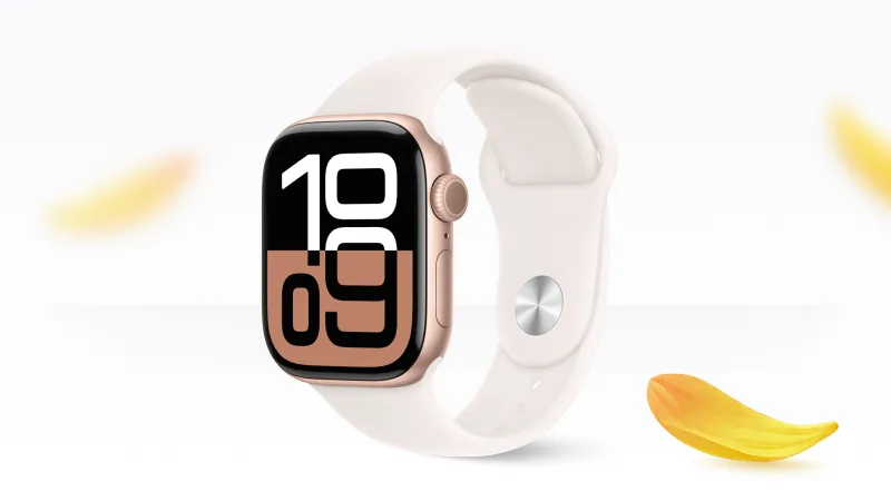The watchface view of Apple Watch Series 10 with yellow flower petals falling around it.