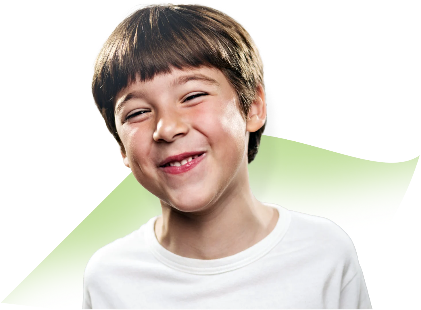 A child looking straight ahead and smiling.