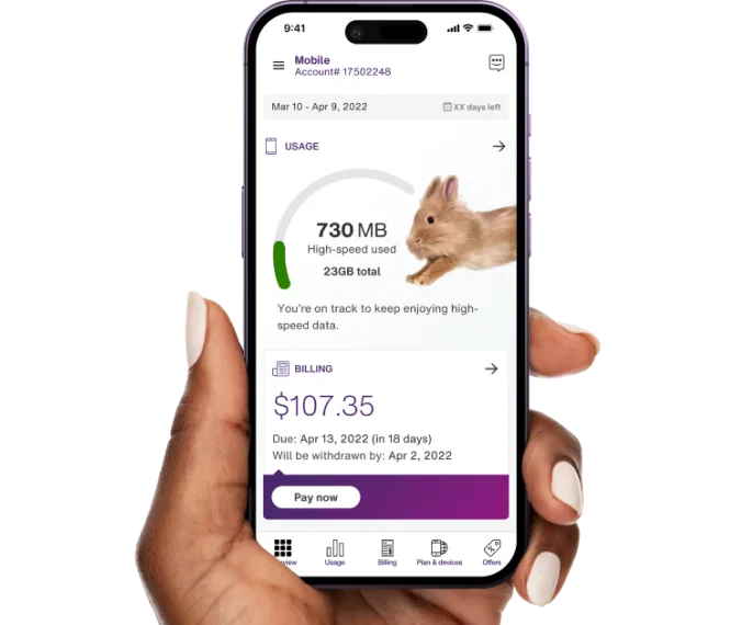 A hand holds a smartphone, with a screen displaying a customer’s bill on the My TELUS app.